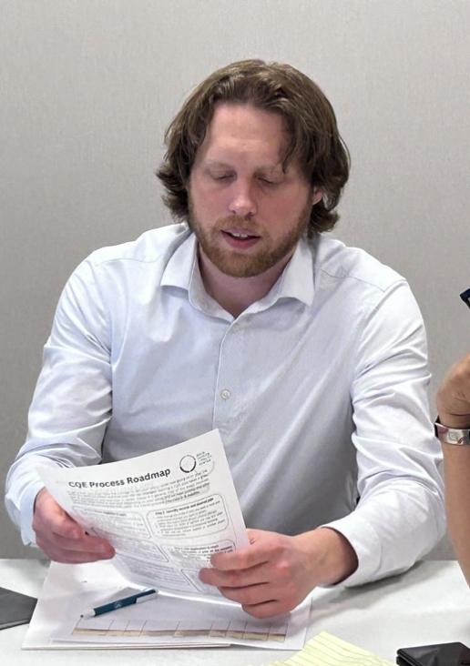 Staff Attorney Josh Hinkel works at an expungement clinic