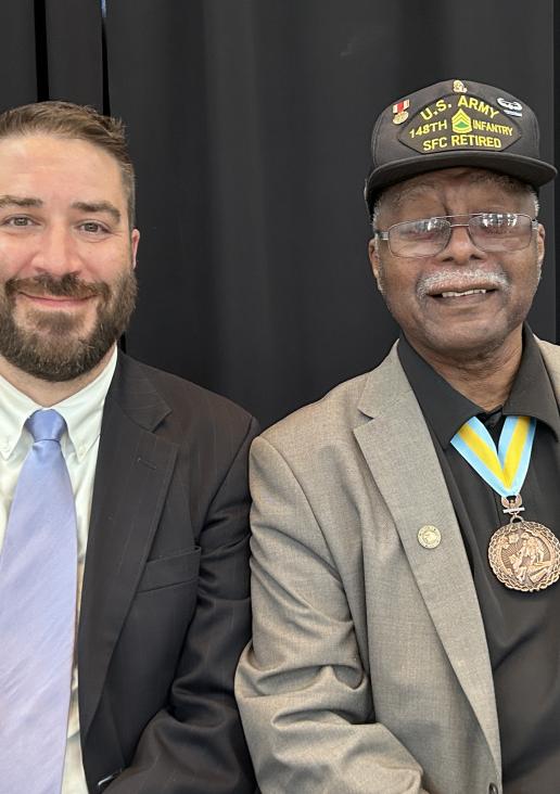 Attorney John Roszczyk and client Sgt. Johnnie Downs